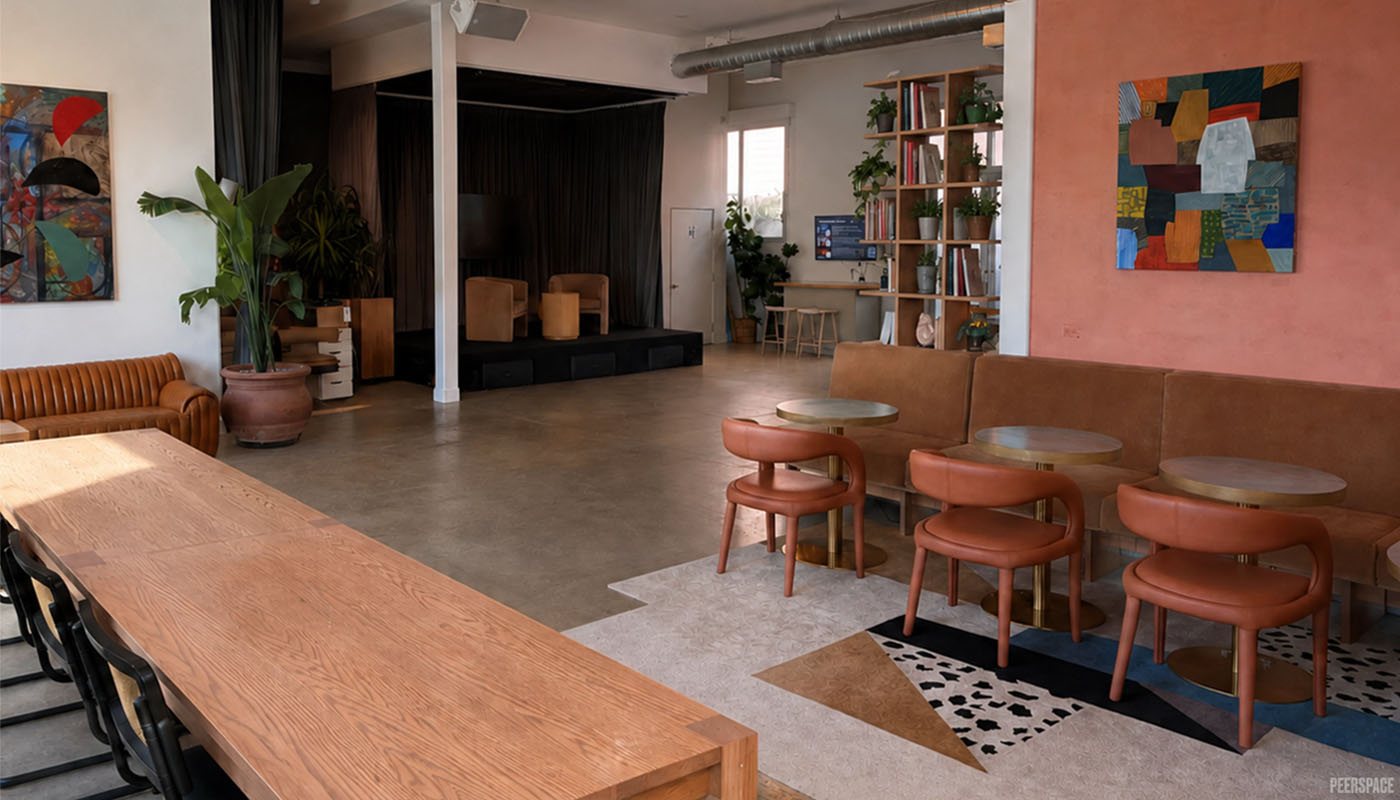 The Clubhouse loft with long table and café seating