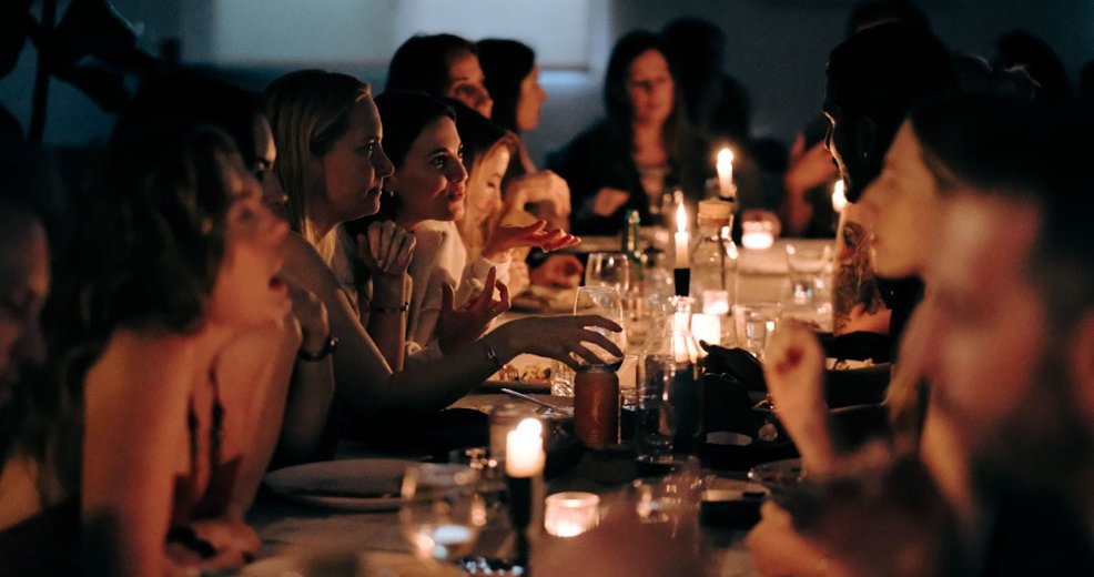 A candlelit long-table dinner at The KINN